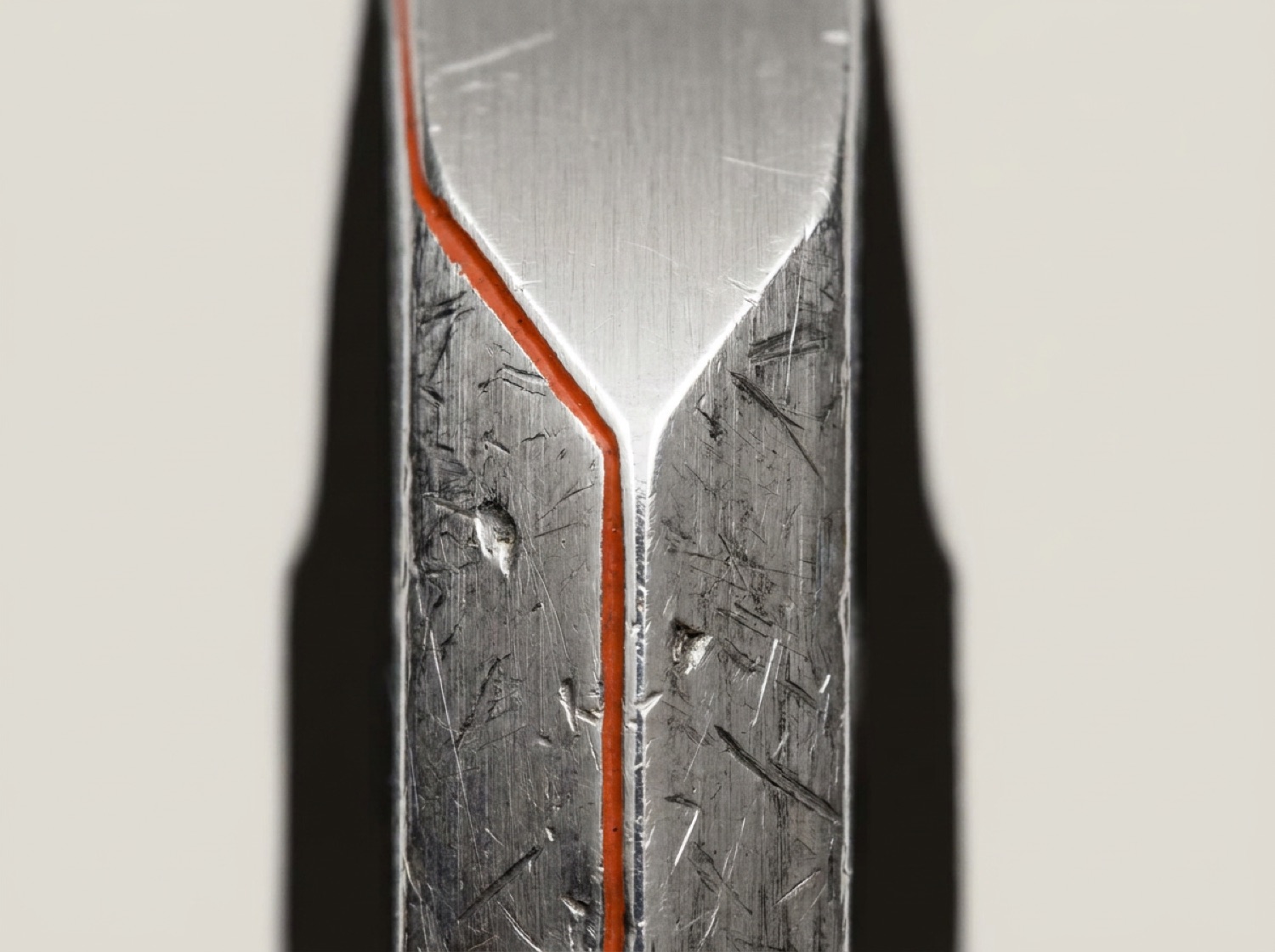 Ultra-tight profile of a battered vintage steel chronograph case with sharp, unpolished factory lug corners